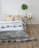 Moroccan Pom Pom Blanket - white and light gray