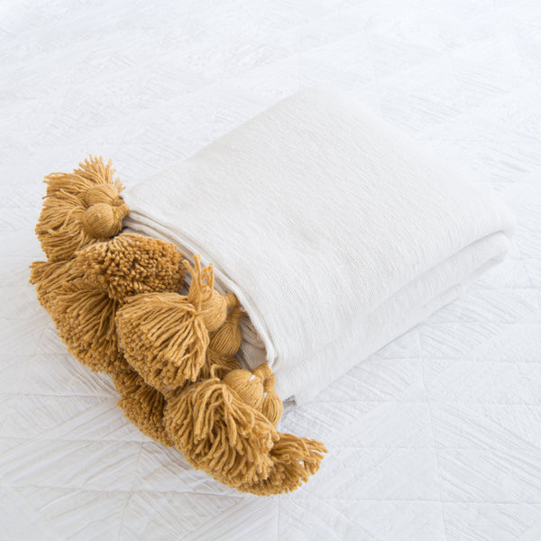 Moroccan Pom Pom Blanket - white and mustard
